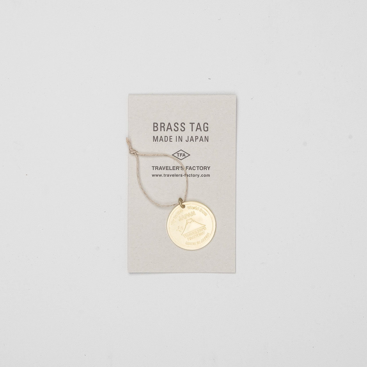 STORE ONLY: Traveler's Factory Brass Tag Japan Trip aus Messing